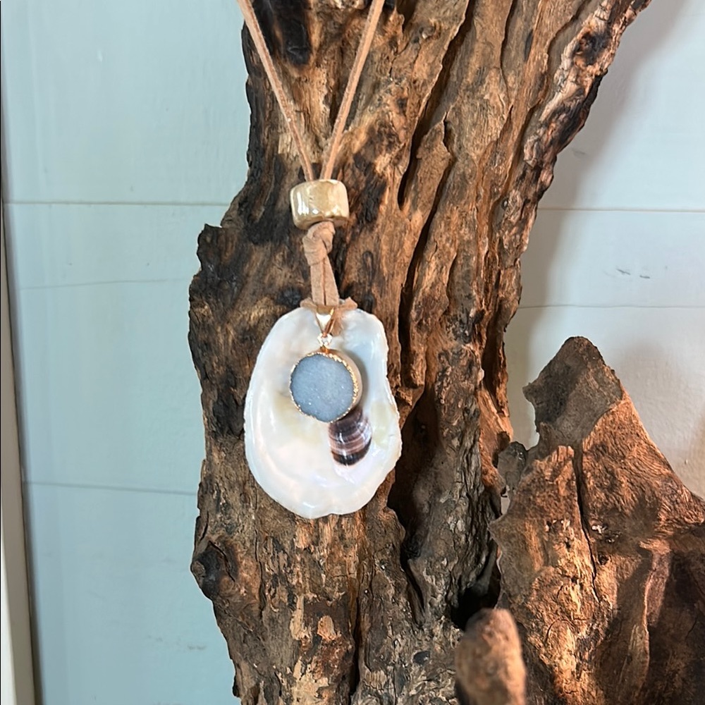 Elegant Blue and Gold Pendant on Oyster Shell Necklace